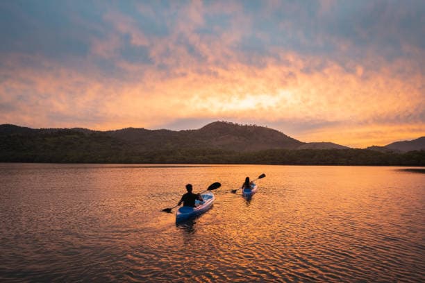 kayaking at sunset